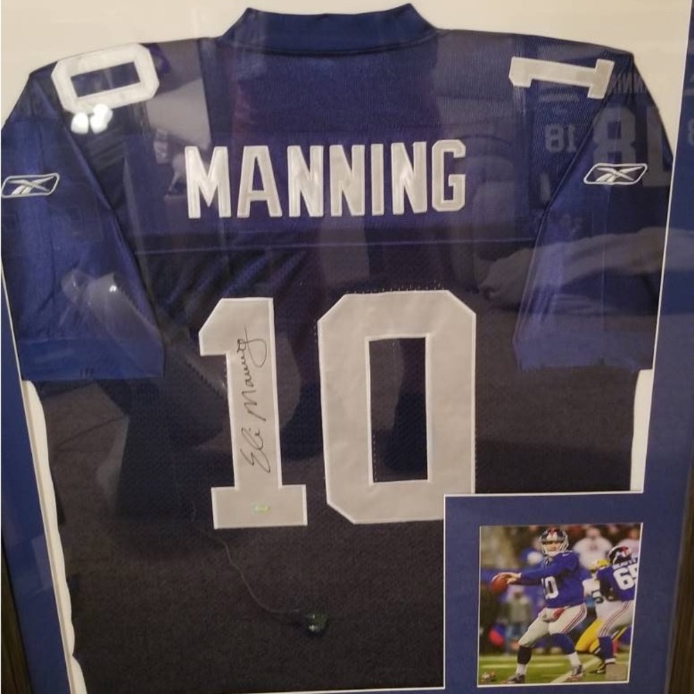 Authentic autographed Eli Manning jersey. (Professionally Framed)